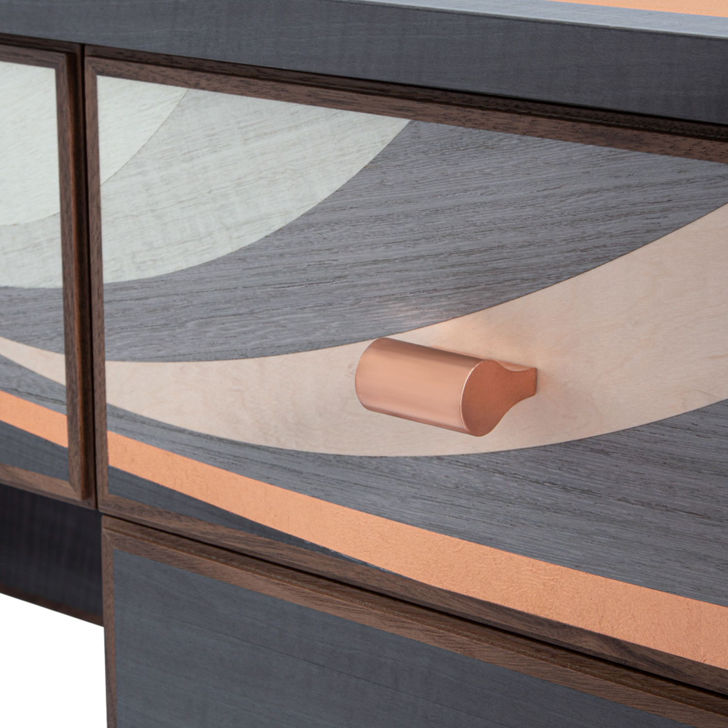 Procreo Emilio Desk closed up detail with curved marquetry pattern and bronze accents.